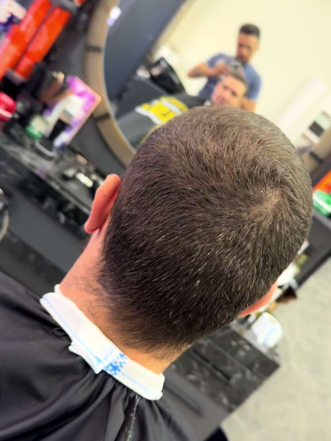 Korte coupe van achteren gezien, met strakke nek, bij City Style Barbershop Valkenswaard